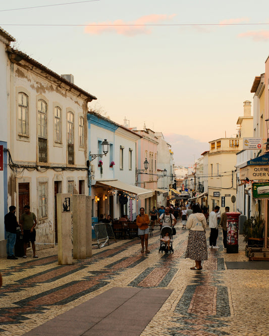 Warm golden street scene in a Portuguese town — moving to Portugal with family